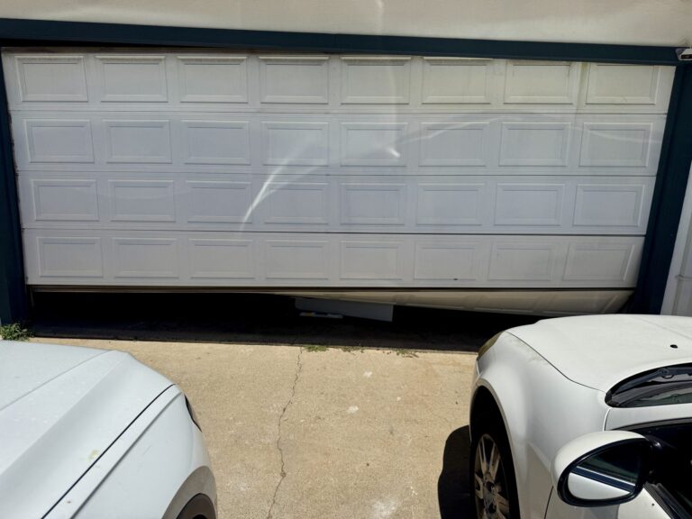 Garage door off its track in Citrus Heights, CA (photo 1)