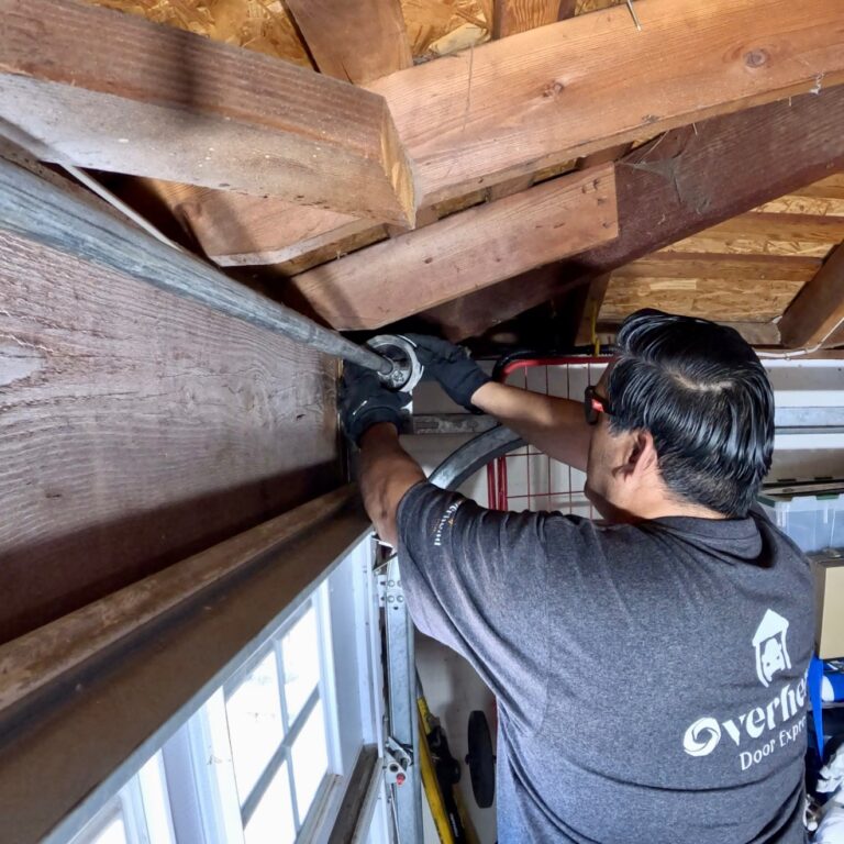 Overhead Door Express technician performing cable reset in Citrus Heights, CA